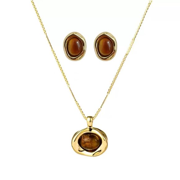 Conjunto de joyería Axepet con piedra ojo de tigre tono dorado