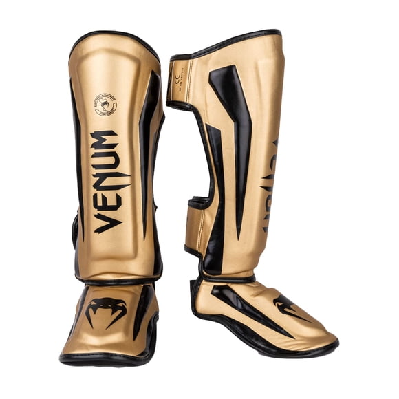 Espinilleras Venum Elite Standup doradas/negras talla M