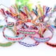 thumbnail image 3 of Pulseras de la amistad tejidas con cierre de nudo corredizo para mujeres, niñas y hombres. Ajustables (paquete de 4)., 3 of 5