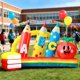 thumbnail image 1 of Inflable DomKom 2,4 m con luces LED – Decoración de regreso a clases, 1 of 8