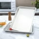 thumbnail image 4 of Bandeja para hornear de aluminio 5220 de 1/4" de tamaño 9 x 13" para galletas, panes y más, 4 of 5
