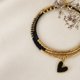 thumbnail image 1 of Maxi Pulsera Miyuki Negra y Dorada con Dije de Corazón – elegancia que se usa todos los días, 1 of 3