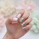 thumbnail image 1 of Uñas Press-on Adhesivas Postizas Reutilizables 10pcs Flores Verdes Tallas M, 1 of 10