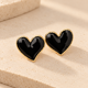 thumbnail image 3 of Aros Corazón Xl Borde Dorado Estilo Chunky negro Talla Única, 3 of 3