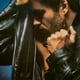 thumbnail image 1 of Vinyl Faith Mármol rojo/negro Sony Music Canada Entertainment, 1 of 1