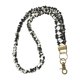 thumbnail image 1 of Lanyard WEZEBEL estilo scrunchie elástico negro a cuadros, 1 of 5