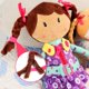 thumbnail image 4 of Muñeca de peluche Snuggle Stuffs Sugar Snap Learn to Dress, 15 cm, color morado, 4 of 7