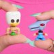 thumbnail image 2 of Set de 9 figuras Disney Doorables Pixar Toy Story – Colección Sid's Toy Box, 2 of 6