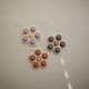 thumbnail image 3 of Flower Press Toy mushie Flower Press Toy rosa, rubor y arena, 3 of 9