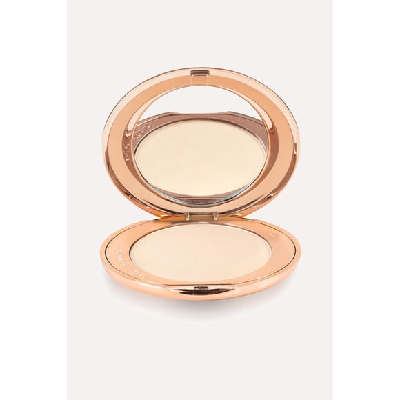 Aerógrafo Powder Charlotte Tilbury, acabado impecable, feria