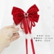 thumbnail image 5 of Accesorios de Cacampanao para Año Nuevo para niñas con lazo grande rojo, cinta de pompón roja, decoración navideña Cacampanaopin al por mayor, 5 of 5