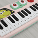 thumbnail image 2 of Teclado piano infantil dinosaurio 18 teclas | juguete, 2 of 3