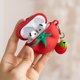 thumbnail image 2 of Funda ZURCAS 3D Huevo Tomate con Llavero para AirPods 4, 2 of 7