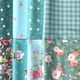 thumbnail image 2 of Tela Mililanyo con estampado floral verde y rosa en cuartos gruesos, 8 unidades, 46 x 56 cm, 2 of 7