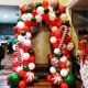thumbnail image 4 of Kit de arco de guirnalda de globos navideños, 200 piezas, con globos de caramelo rojos y blancos de Navidad, caja de regalo, globos de estrella roja para decoraciones de fiesta, 4 of 4