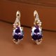 thumbnail image 1 of 18K Gold Plated Blue Sapphire Stud Earrings - Trendy Women's Anniversary Jewelry with Oval Cut White Blue Red Pink Stones, 1 of 5
