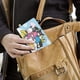 thumbnail image 5 of Sanrio Porta Pasaporte y Cartera de Viaje Premium de Cuero PU, Funda de Pasaporte Bloqueo RFID con Ranuras para Tarjetas de Crédito, Estuche para Libro de Pasaporte para Familia 10cm × 15cm, 5 of 6
