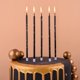 thumbnail image 2 of Velas PHD CAKE 24 uds negro y dorado 14 cm finas, 2 of 6