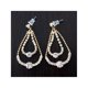 thumbnail image 1 of Aros Colgantes Largos Con Pedreria Color Dorado, 1 of 2