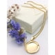 thumbnail image 2 of Colgante con dije Vintage Relicario Circular relieve flores chapado en oro 18kl, 2 of 3