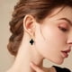 thumbnail image 3 of Pendientes colgantes de trébol de oro para mujeres, pendientes colgantes de aro pequeños chapados en oro de 14 quilates, elegantes pendientes de trébol de cuatro hojas, pendientes brillantes con amule, 3 of 7