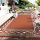 thumbnail image 4 of Alfombra MilleLoom 274 cm x 366 cm impermeable para exteriores en naranja terracota, 4 of 9