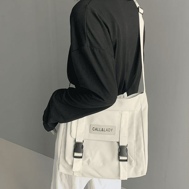 Upgrade Your Preppy Style with Our Trendy Shoulderbag - Perfect for Students! Featuring a Cute Cartoon Decor and Spacious Interior with Plastic Buckle and Zipper Closure.