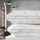 thumbnail image 1 of Almohadas de cama con el logotipo de Calvin Klein de densidad media, tamaño king, x2, 1 of 8