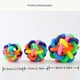 thumbnail image 2 of Dog Rubber Ball With Bell Rainbow Bouncy Woven Toy, Non-Toxic Bite Resistant Rubber Treat Balls, 2 of 2