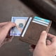 thumbnail image 3 of Cartera Travelambo Slim de piel con bloqueo RFID de 8 cm x 10 cm, 3 of 9