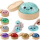 thumbnail image 1 of Juguete antiestrés LEGEOS Dumpling con glitter, squishy de 8,5 cm, 1 of 6