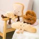 thumbnail image 4 of Peluche de croissant, adorable peluche de comida, almohada de peluche con forma de baguette, pretzel, pan tostado o croissant (croissant), 4 of 7