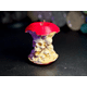 thumbnail image 1 of Figura De Manzana Con Calaveras, 1 of 1