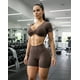 thumbnail image 1 of Conjunto Deportivo Peto con Mangas Cortas y Short, 1 of 7