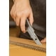 thumbnail image 3 of Cutter Exacto Cuchillo Cartonero Metálico + 5 repuestos 30002 Tolsen plateado 3x8x22, 3 of 3