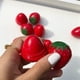 thumbnail image 2 of Pack 12 Balsamos Labial De Frutilla Hidrata Labios Lau, 2 of 3