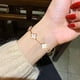 thumbnail image 3 of Pulsera de trébol para mujer, pulsera de trébol de cuatro hojas chapada en oro de 18 quilates, joyería de trébol de cuatro hojas ajustable de la suerte de acero de titanio para niñas, regalo del Día d, 3 of 7