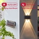thumbnail image 2 of Iluminaciones De Pared Solar Arriba Abajo 2 Paquete 4 Led Sconce Solar Iluminación De La Valla Impermeable De La Cubierta Para La Decoración Al Aire Libre De La Casa (blanco Cálido Y Blanc, 2 of 3