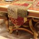 thumbnail image 4 of Caminos de mesa Loom and Mill 33 × 183 cm Triángulo Rojo y Oro, 4 of 7