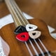 thumbnail image 3 of Púas para ukelele, piel con agujero en forma de diamante, paquete de 4 unidades, 3 of 8