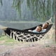 thumbnail image 5 of Hamaca de jardín de algodón, cómoda tela, elegantes borlas de lujo, duradera, hasta 500 libras, portátil, con bolsa de viaje, perfecta para porche, patio, dormitorio, exterior e interior., 5 of 5