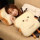 thumbnail image 5 of Almohada de mano cálida con forma de pan tostado para niñas, mujeres y niños, cojín de peluche para decoración del hogar, cojín de sofá de felpa (bonito), 5 of 7