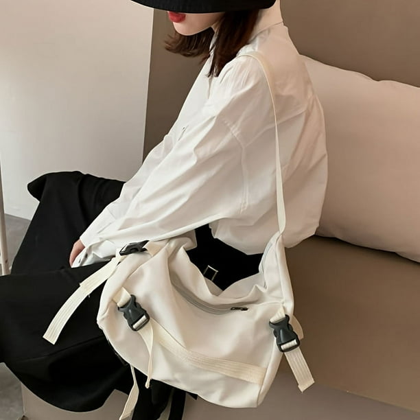 Get Ready for Campus with our Large Capacity Canvas Crossbody Bag - Fashionable and Spacious Shoulder Purse with Bag Charm