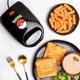 thumbnail image 1 of Sandwichera Uncanny Brands Poké Ball 120V antiadherente, 1 of 8