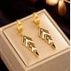 thumbnail image 2 of Aros Flechas Colgantes - Acero Bañado En Oro 18k, 2 of 3