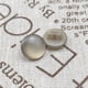 thumbnail image 1 of Botones de Resina Suxumhao Media Luna Caqui 16L 100 Piezas, 1 of 3