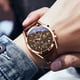 thumbnail image 2 of Reloj OLEVS Cronógrafo 40 mm Caja de Acero Dorado con Correa de Cuero, 2 of 3