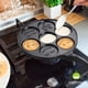 thumbnail image 2 of Pancake Pan con 7 Smiley Rostro, Pancake Maker Antiadherente Mini Pancake Griddle Pan para Niños, Negro, 2 of 7