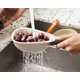 thumbnail image 5 of Colador de alimentos Joseph Joseph Mini con manijas plegables, 5 of 7