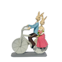 Decostilo - Figura Decorativa Pareja De Conejos En Bicicleta 20Cm